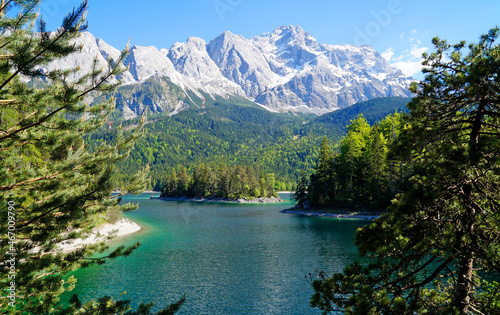 Tableau sur toile picturesque turquois alpine lake Eibsee (yew lake) by the foot of mountain Zugsp