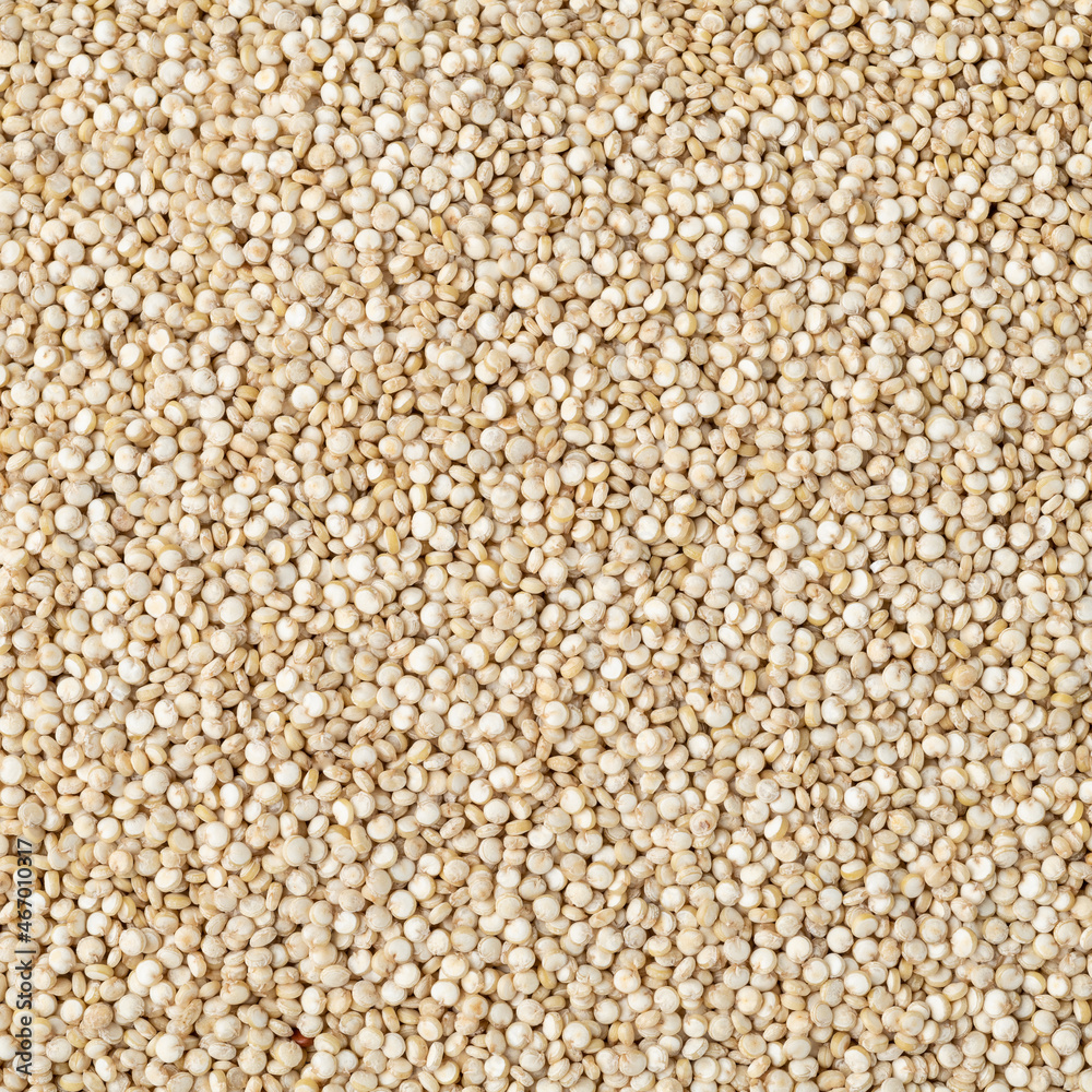 Top view, closeup of raw quinoa grains. Food backdrop Top view, closeup of raw quinoa grains. Food backdrop