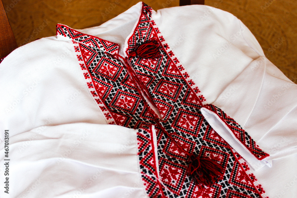 Vyshyvanka - national Ukrainian clothes. Embroidery with red and black threads on white fabric