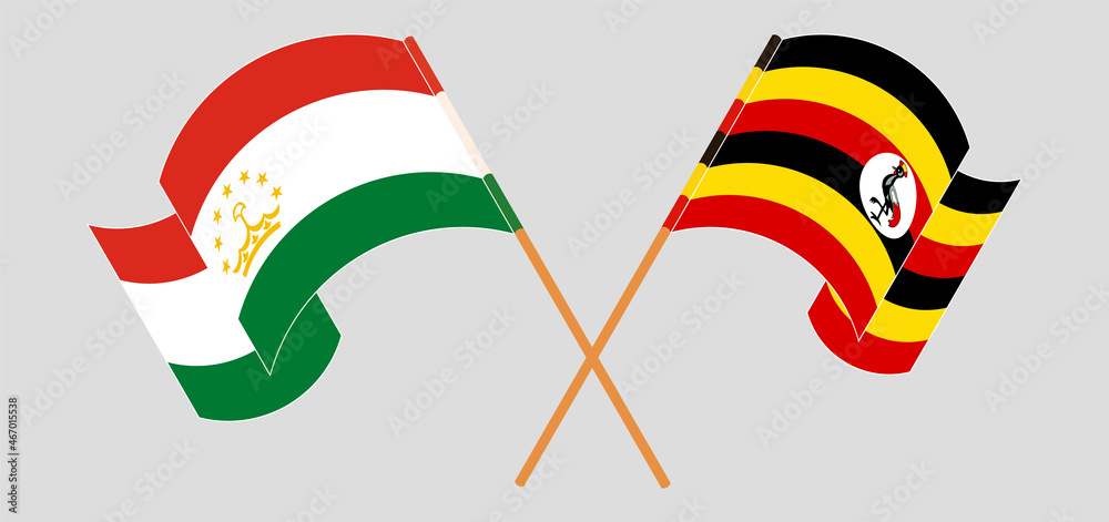 Crossed flags of Tajikistan and Uganda. Official colors. Correct proportion