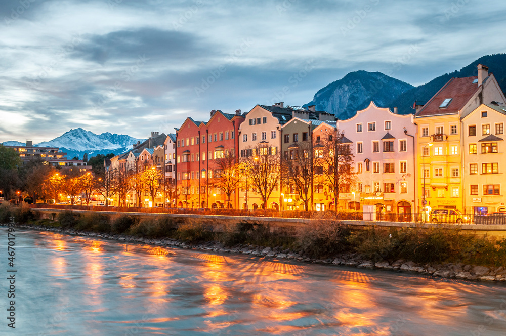 Innsbruck, Austria. Colorful houses by the river at dusk on October 17,2012.