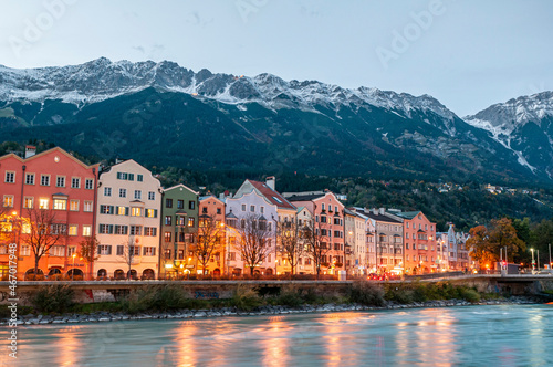 Innsbruck, Austria. Colorful houses by the river at dusk on October 17,2012.