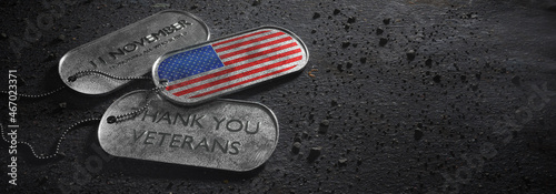 American National Holiday. US military dog tag with American stars, stripes and national colors. Memorial Day or Veterans Day concept.
