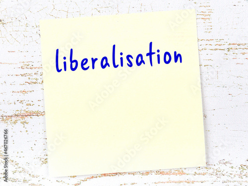 Εκτύπωση καμβά Yellow sheet of paper with word liberalisation. Reminder concept