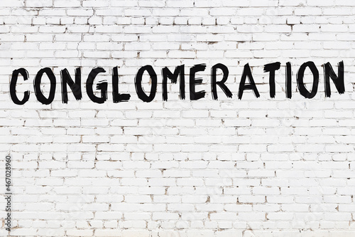 White wall with black paint inscription conglomeration on it
