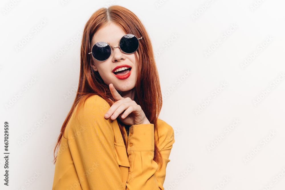 fashionable woman in yellow shirt sunglasses posing fashionable woman in yellow shirt sunglasses posing
