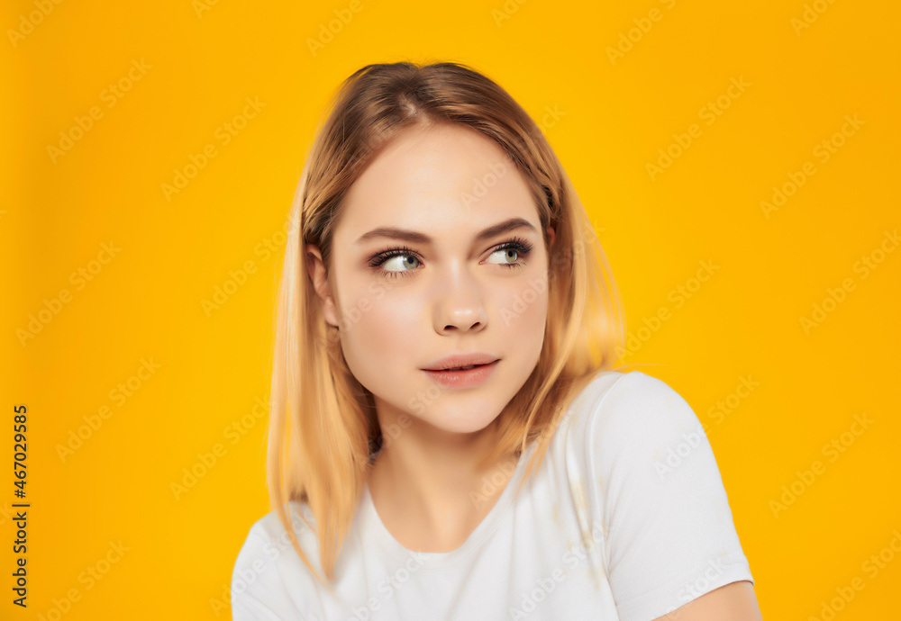 pretty woman in a white attractive look happy Lifestyle yellow background pretty woman in a white attractive look happy Lifestyle yellow background