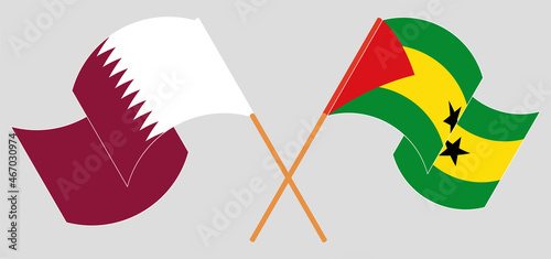Crossed flags of Qatar and Sao Tome and Principe. Official colors. Correct proportion