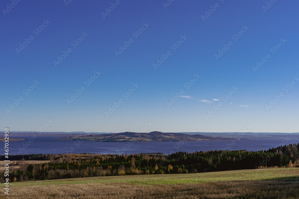 Fototapeta premium Helgøya Island in Lake Mjøsa at autumn.