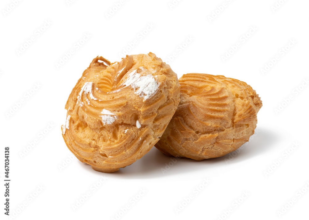 two baked round eclairs on a white background two baked round eclairs on a white background