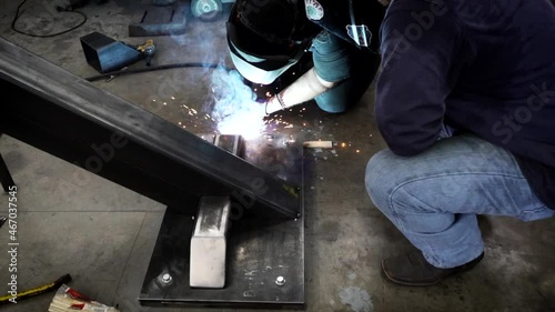 Men Welding Together on Steel Slow Motion 4K