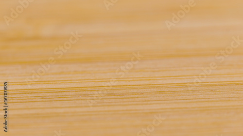 MACRO, DOF: Detailed close up shot of an empty handmade wooden cutting board.