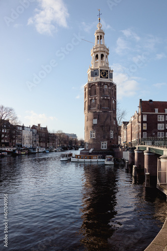 Montelbaanstoren Tower over the Oudeschans canal in Amsterdam, Netherlands