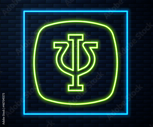 Glowing neon line Psychology icon isolated on brick wall background. Psi symbol. Mental health concept, psychoanalysis analysis and psychotherapy. Vector