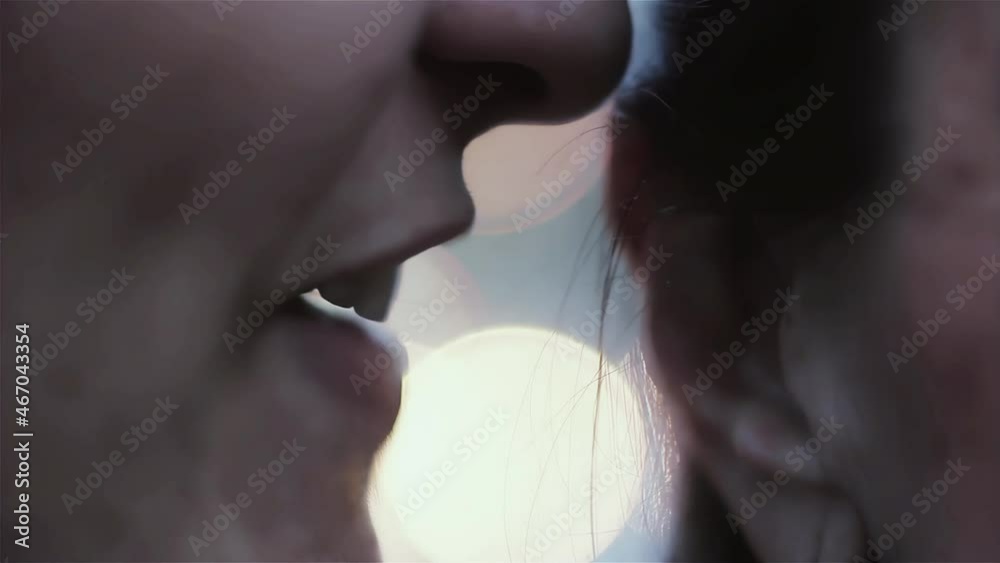 Woman whispering Something Outdoors. Close Up. 4K Resolution.