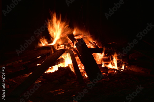 slow speed of burning wood fire in the dark