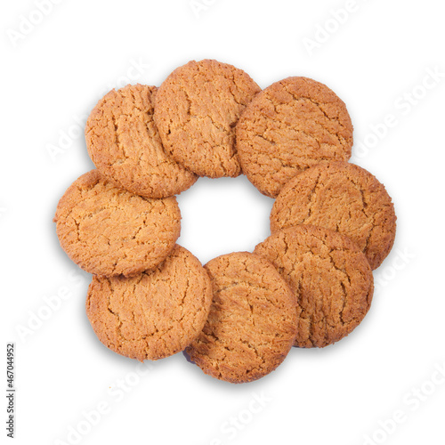 Gingernut biscuits in a ring on white