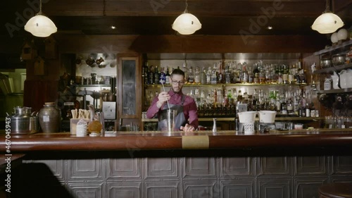 A bartender spinning his spoon photo