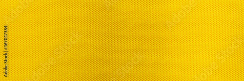 Yellow color sports clothing fabric football shirt jersey texture and textile background, Wide banner.