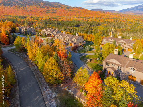 high angle view of apartment community in autumn forest