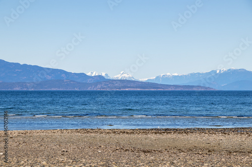 view of snow capped mountains and sea on the Pacific Coast of Canada