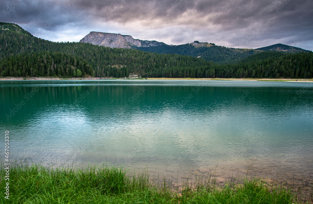 Black Lake and mountains at sunset,Durmitor National Park,Montenegro,East Europe. Black Lake and mountains at sunset,Durmitor National Park,Montenegro,East Europe.