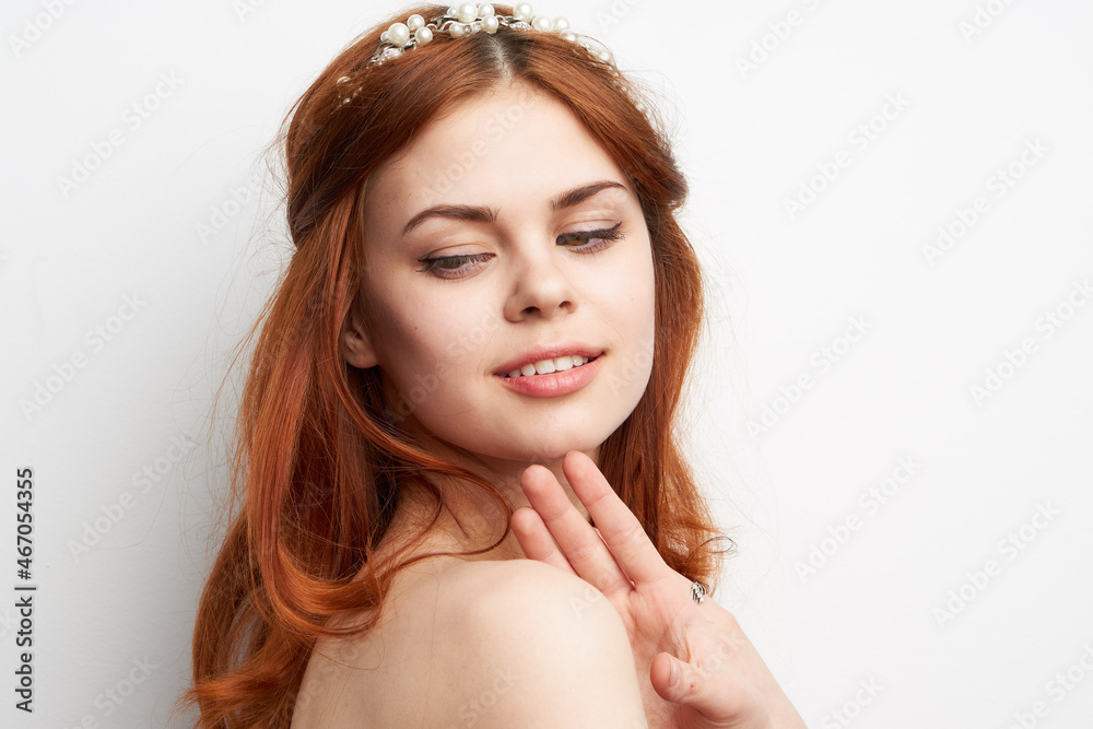 Fototapeta premium beautiful woman red hair decoration cosmetics close-up