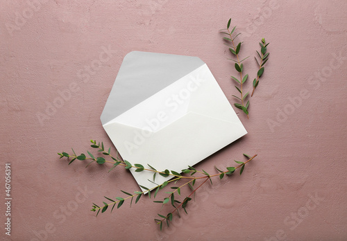 White open envelope with gr...