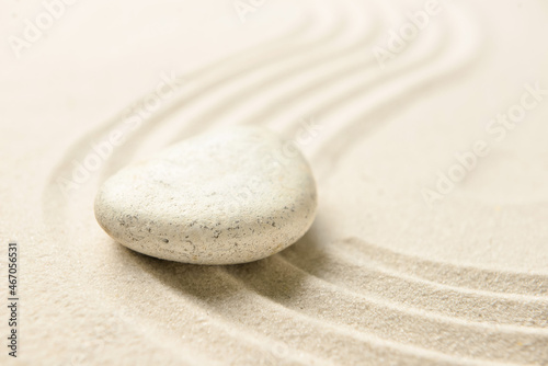 Spa stone on light sand
