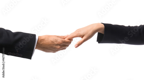 Businessman holding woman's hand on white background