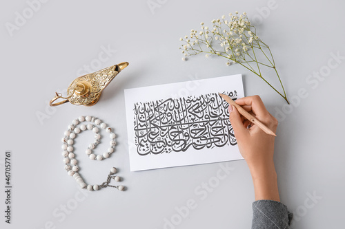 Arabic calligraphist writin...