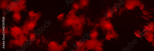 Toned night sky with fluffy soft clouds. Black red abstract background with copy space for design. Wide banner. Panoramic. © Наталья Босяк