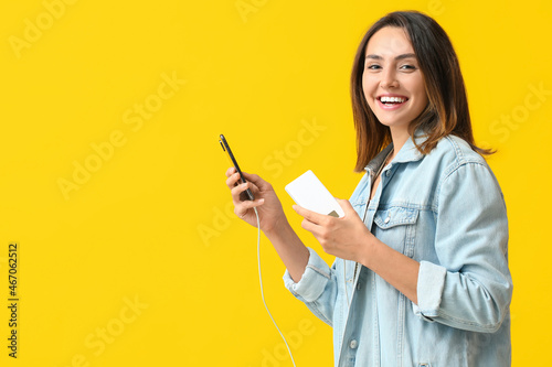 Young woman with phone and ...