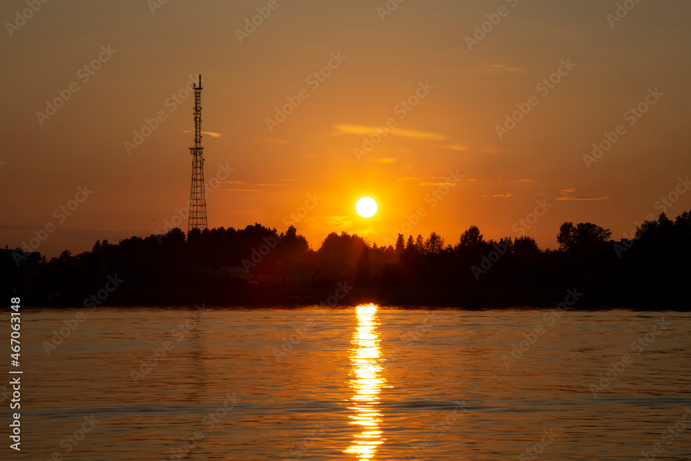 Sunset on the background of a television tower in Sortavala, Republic of Karelia in Russia