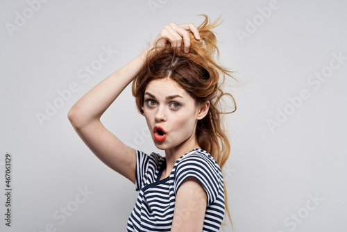 pretty woman holding hair makeup posing fun fashion isolated background
