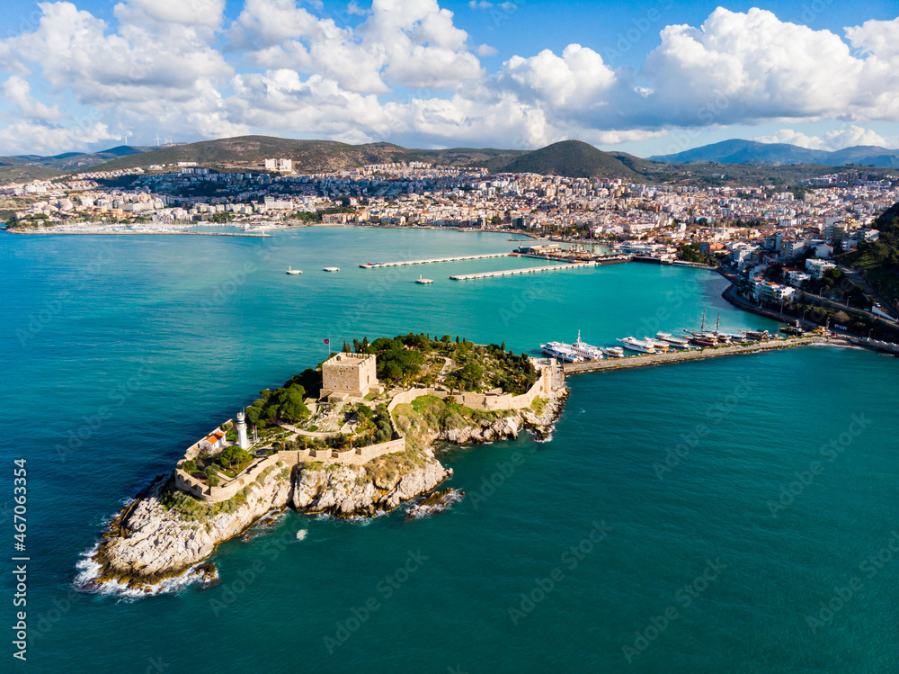 View from drone of Pigeon Island with medieval fort on Turkey's Aegean coast in Kusadasi. High quality photo