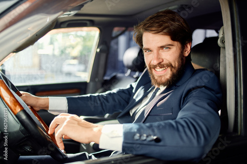 emotional man Driving a car trip luxury lifestyle communication by phone © SHOTPRIME STUDIO