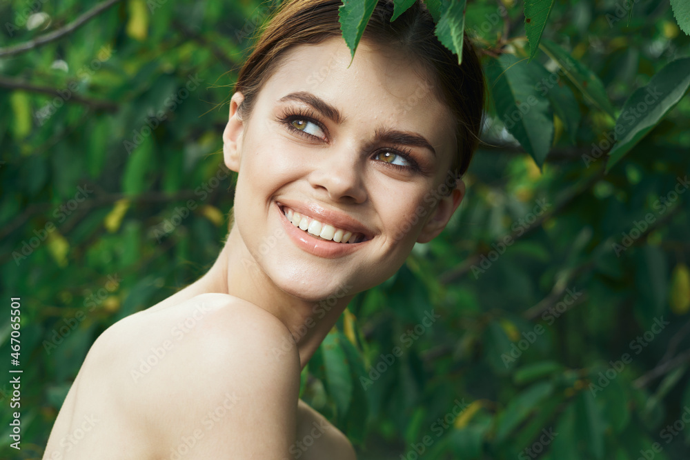 smiling woman skin care bare shoulders green leaves nature Lifestyle smiling woman skin care bare shoulders green leaves nature Lifestyle