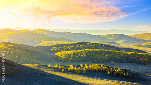 Colorful forest and mountain natural landscape in autumn.Beautiful autumn scenery in the Ulan Butong grassland,Inner Mongolia,China. photo