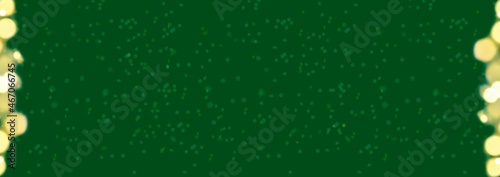 Green Christmas banner with bokeh. Copy space.
