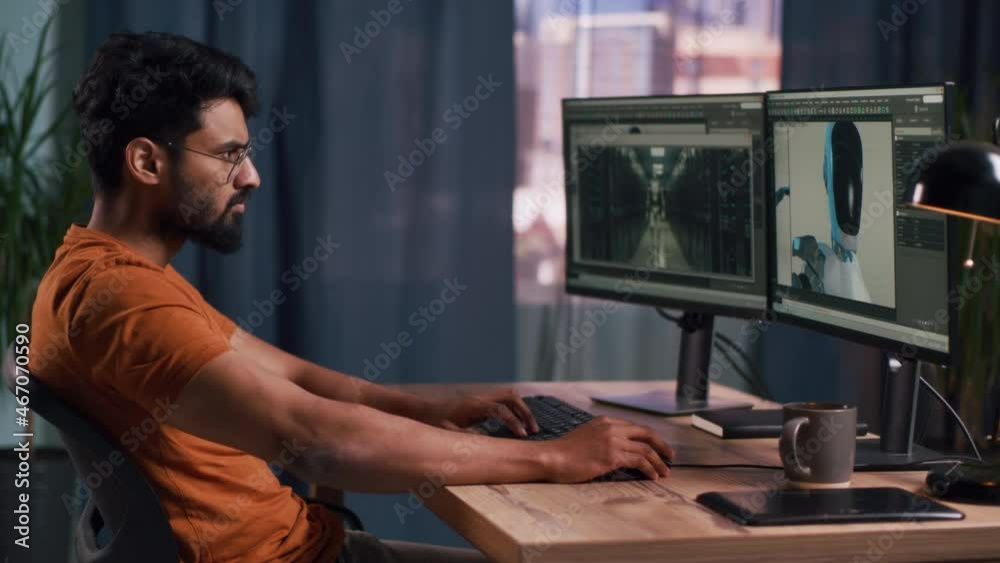Indian man creating 3D model for film Indian man creating 3D model for film