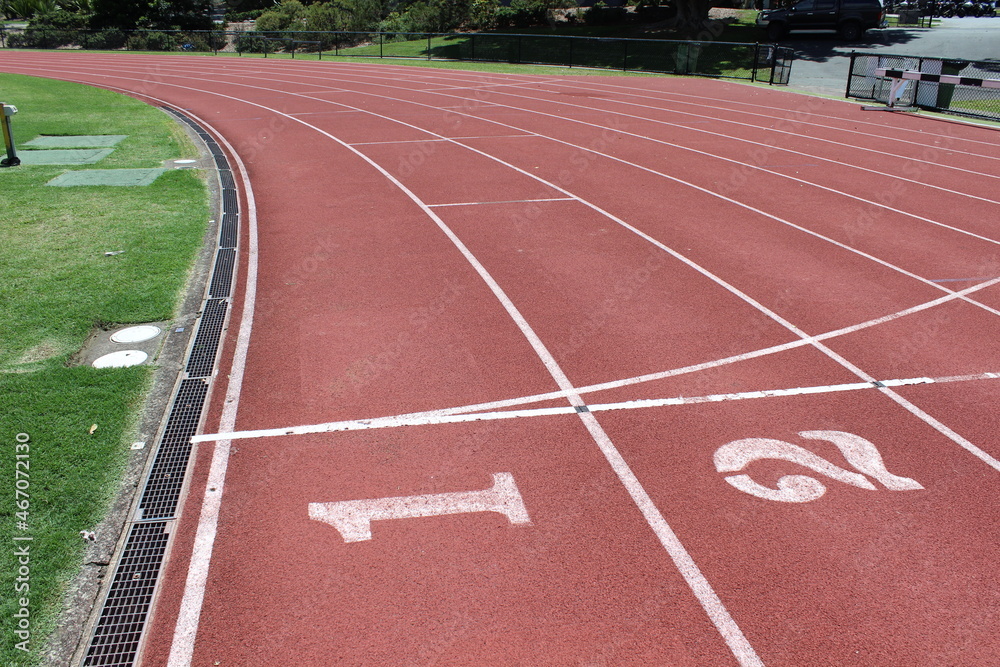 Close up of the first two lanes of an athletics running track