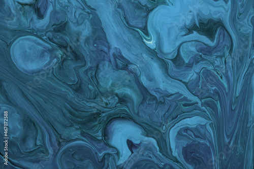 Abstract fluid art background navy blue and turquoise colors. Liquid marble. Acrylic painting with sapphire gradient.