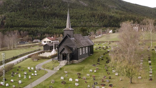 Copy Of An Older Church That Burned Down. Heidal Church In Sel Municipality, Innlandet County, Norway. Aerial Pullback photo