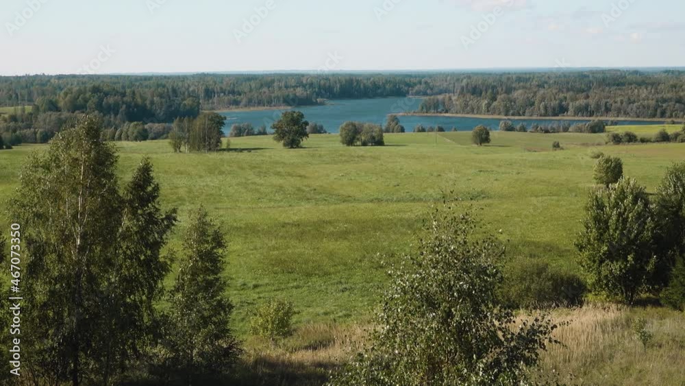 Lake Pintelis in a beautiful location. Clean lake in summer, with beautiful green biological nature Lake Pintelis in a beautiful location. Clean lake in summer, with beautiful green biological nature