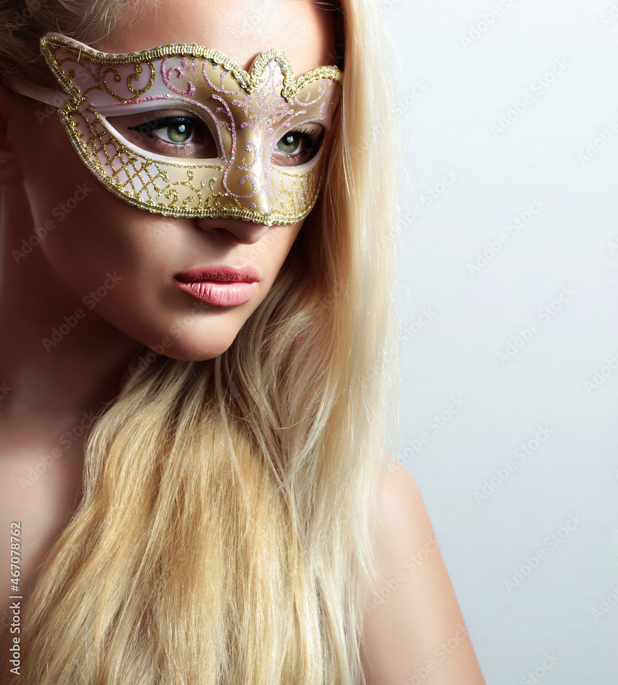 Beautiful young Woman in Mask. Blonde Girl Beautiful young Woman in Mask. Blonde Girl