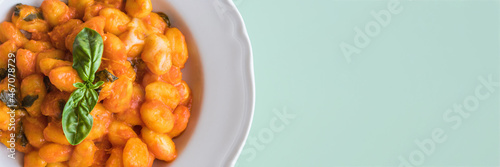Italian potato gnocchi pasta with tomato sauce and mozzarella cheese