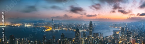 Hong Kong city with Victoria Harbor view from peak at dawn 