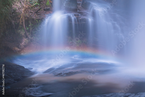 Water fall with rainbow located in deep rain forest jungle at Chiang Mai  Thailand