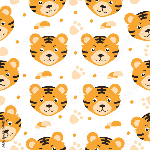 Cute tiger on a white background with dots, spots and footprints. Seamless pattern. Can be used for wallpaper, fill web page background, surface textures